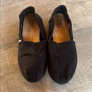 TOMS Black Canvas Slip-Ons